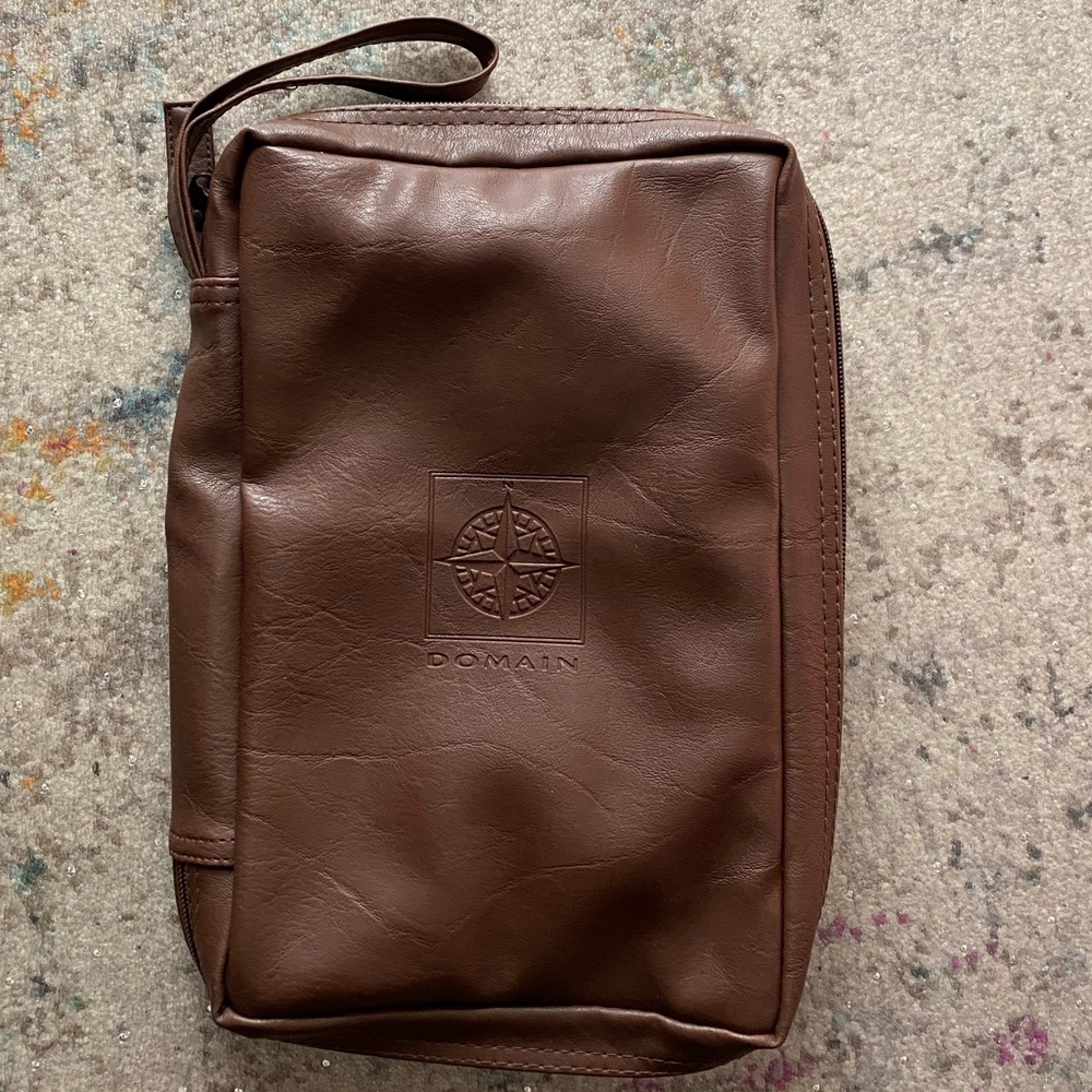 New Mary Kay Domain toiletry bag, approximately 11” x 7”.